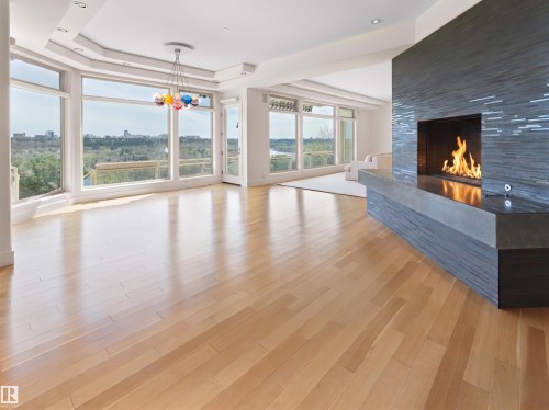 28 Riverside Crescent, Edmonton, AB - Indoor Photo Showing Living Room With Fireplace