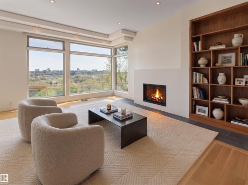 28 Riverside Crescent, Edmonton, AB - Indoor Photo Showing Living Room With Fireplace