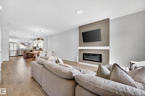 52 Penn Place, Spruce Grove, AB - Indoor Photo Showing Living Room With Fireplace