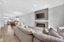 52 Penn Place, Spruce Grove, AB  - Indoor Photo Showing Living Room With Fireplace 