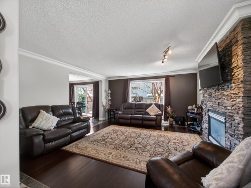 40 English Way, St. Albert, AB - Indoor Photo Showing Living Room With Fireplace