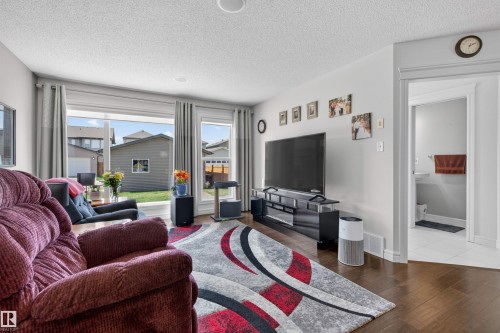 41 Tribute Common, Spruce Grove, AB - Indoor Photo Showing Living Room