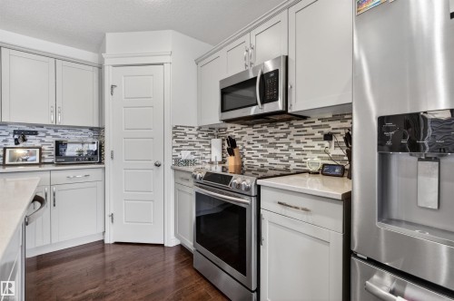 41 Tribute Common, Spruce Grove, AB - Indoor Photo Showing Kitchen With Upgraded Kitchen