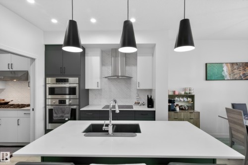 1412 11 Avenue, Edmonton, AB - Indoor Photo Showing Kitchen With Stainless Steel Kitchen With Double Sink With Upgraded Kitchen