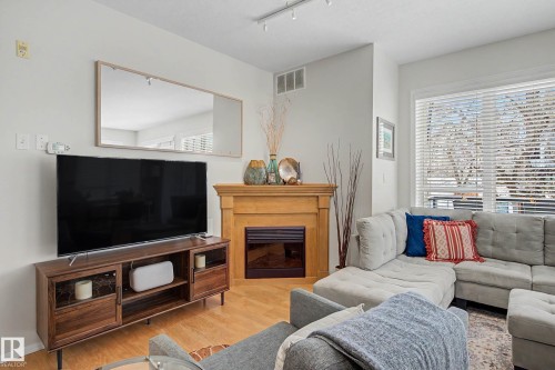 334 10023 110 Street, Edmonton, AB - Indoor Photo Showing Living Room With Fireplace