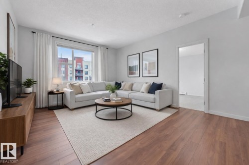 232 308 Ambleside Link, Edmonton, AB - Indoor Photo Showing Living Room