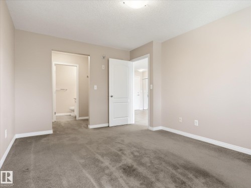 217 12550 140 Avenue, Edmonton, AB - Indoor Photo Showing Other Room