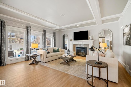 2551 Cameron Ravine Landing, Edmonton, AB - Indoor Photo Showing Living Room With Fireplace