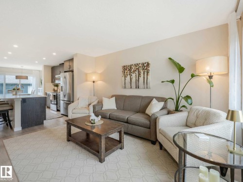 2426 Trumpeter Way, Edmonton, AB - Indoor Photo Showing Living Room
