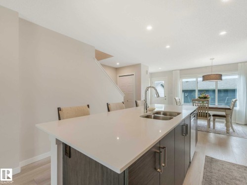 2426 Trumpeter Way, Edmonton, AB - Indoor Photo Showing Kitchen With Double Sink