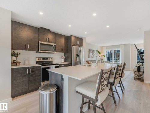 2426 Trumpeter Way, Edmonton, AB - Indoor Photo Showing Kitchen With Stainless Steel Kitchen With Upgraded Kitchen