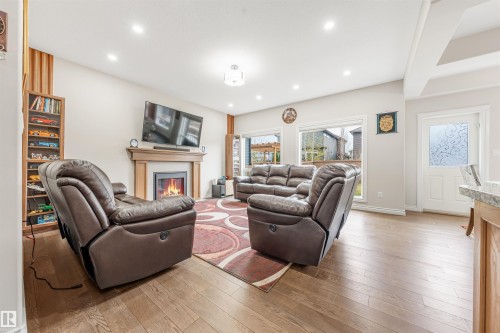 5907 19 Avenue, Edmonton, AB - Indoor Photo Showing Living Room With Fireplace