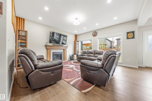 5907 19 Avenue, Edmonton, AB - Indoor Photo Showing Living Room With Fireplace