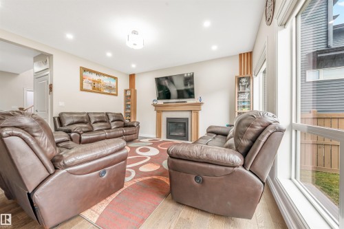 5907 19 Avenue, Edmonton, AB - Indoor Photo Showing Living Room With Fireplace