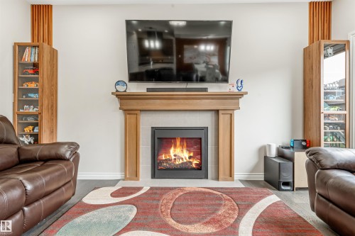 5907 19 Avenue, Edmonton, AB - Indoor Photo Showing Living Room With Fireplace