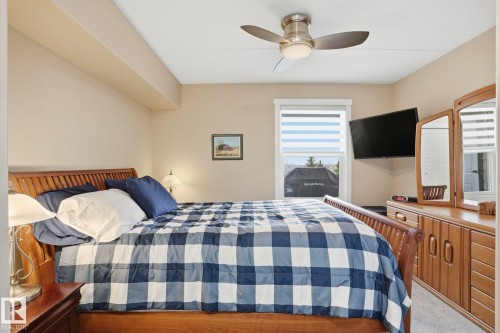 302 4103 50 Street, Beaumont, AB - Indoor Photo Showing Bedroom