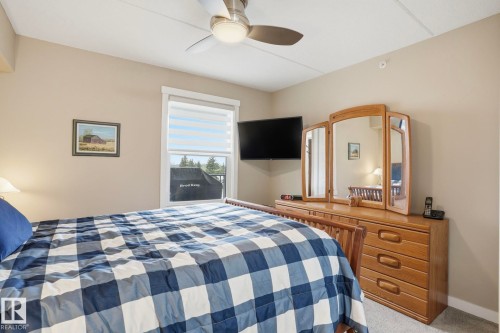 302 4103 50 Street, Beaumont, AB - Indoor Photo Showing Bedroom
