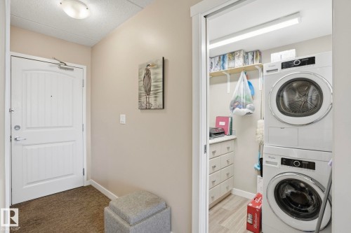 302 4103 50 Street, Beaumont, AB - Indoor Photo Showing Laundry Room