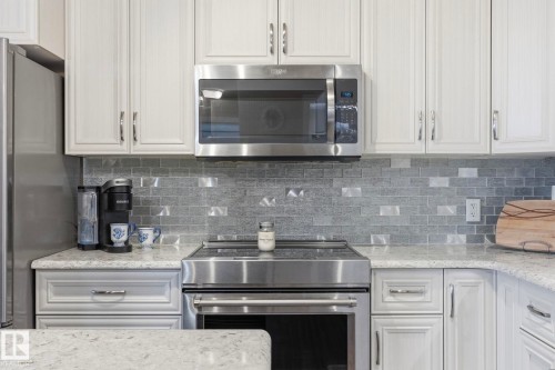 302 4103 50 Street, Beaumont, AB - Indoor Photo Showing Kitchen With Upgraded Kitchen