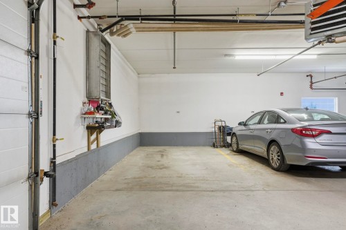 302 4103 50 Street, Beaumont, AB - Indoor Photo Showing Garage