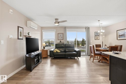 302 4103 50 Street, Beaumont, AB - Indoor Photo Showing Living Room