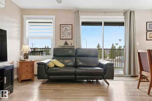 302 4103 50 Street, Beaumont, AB - Indoor Photo Showing Living Room