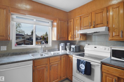 10648 158 Avenue, Edmonton, AB - Indoor Photo Showing Kitchen With Double Sink