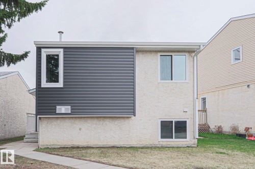 Exterior featuring a combination of stucco and horizontal siding - 35 Chungo Drive, Devon, AB - Outdoor With Exterior