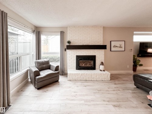 8 Whiteoaks Estates, St. Albert, AB - Indoor Photo Showing Living Room With Fireplace