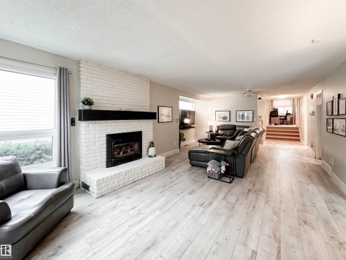 8 Whiteoaks Estates, St. Albert, AB - Indoor Photo Showing Living Room With Fireplace