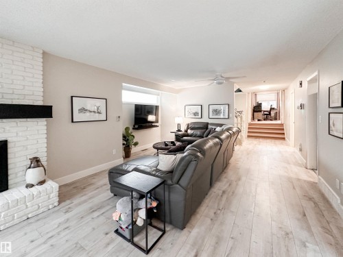 8 Whiteoaks Estates, St. Albert, AB - Indoor Photo Showing Living Room With Fireplace