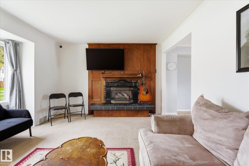 12215 59 Street, Edmonton, AB - Indoor Photo Showing Living Room With Fireplace