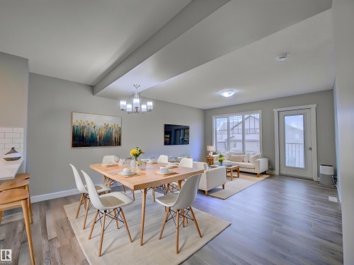 Virtually Staged - 11 165 Cy Becker Boulevard, Edmonton, AB - Indoor Photo Showing Dining Room