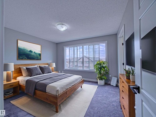 Virtually Staged - 11 165 Cy Becker Boulevard, Edmonton, AB - Indoor Photo Showing Bedroom