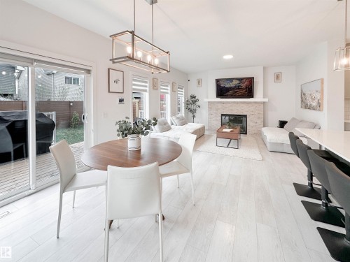 16 Jennifer Crescent, St. Albert, AB - Indoor Photo Showing Dining Room With Fireplace