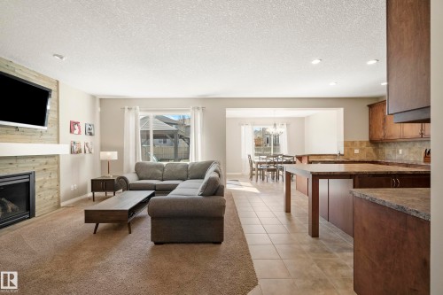 3510 Abbott Close, Edmonton, AB - Indoor Photo Showing Living Room With Fireplace