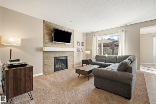 3510 Abbott Close, Edmonton, AB - Indoor Photo Showing Living Room With Fireplace