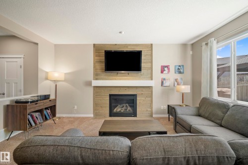 3510 Abbott Close, Edmonton, AB - Indoor Photo Showing Living Room With Fireplace
