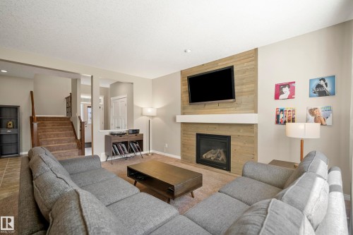 3510 Abbott Close, Edmonton, AB - Indoor Photo Showing Living Room With Fireplace