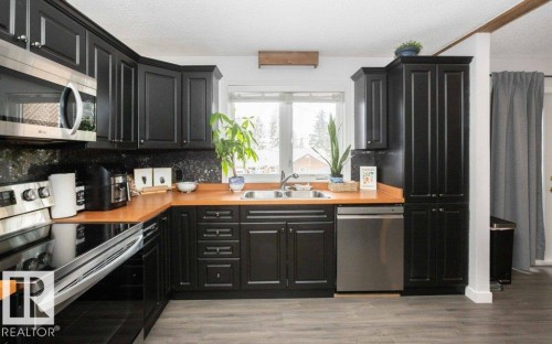 9624 99 Street, Westlock, AB - Indoor Photo Showing Kitchen With Double Sink