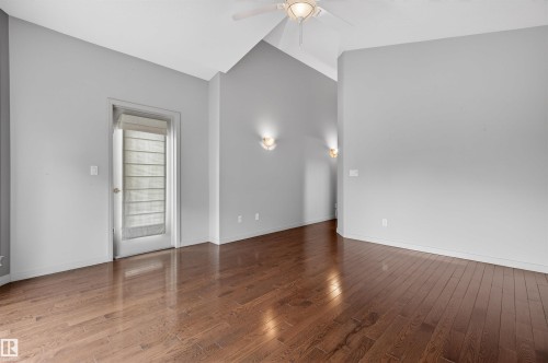 Hardwood-style flooring throughout - 201 Erin Ridge Drive, St. Albert, AB - Indoor Photo Showing Other Room