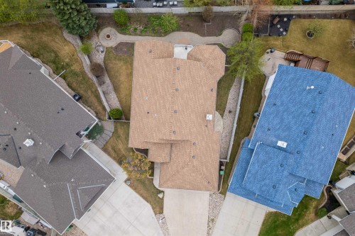 Expansive property featuring a multi-gabled roofline and an elongated driveway - 201 Erin Ridge Drive, St. Albert, AB - Outdoor With View