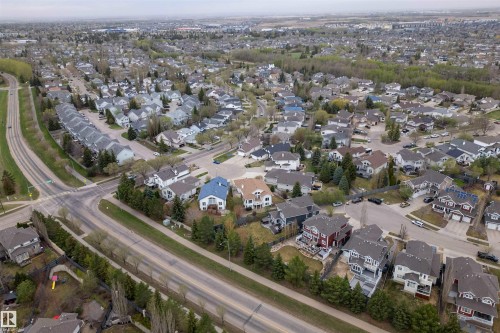 Aerial perspective of a residential neighborhood featuring detached homes and townhomes - 201 Erin Ridge Drive, St. Albert, AB - Outdoor With View
