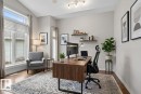 Versatile room featuring wood-finish flooring, an angled vaulted ceiling, and recessed lighting - 201 Erin Ridge Drive, St. Albert, AB  - Indoor Photo Showing Office 