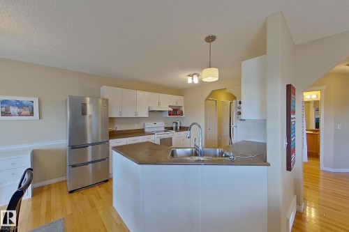 3540 Mclean Crescent, Edmonton, AB - Indoor Photo Showing Kitchen With Double Sink