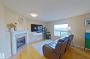 3540 Mclean Crescent, Edmonton, AB  - Indoor Photo Showing Living Room With Fireplace 
