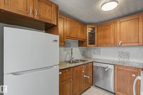 9B Clareview Village, Edmonton, AB - Indoor Photo Showing Kitchen With Double Sink