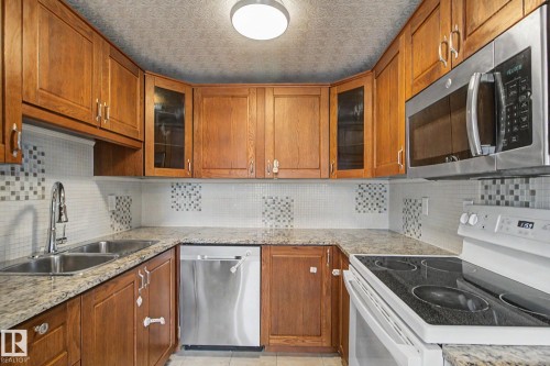 9B Clareview Village, Edmonton, AB - Indoor Photo Showing Kitchen With Double Sink