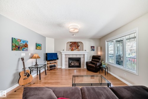 5333 Terwillegar Boulevard, Edmonton, AB - Indoor Photo Showing Living Room With Fireplace
