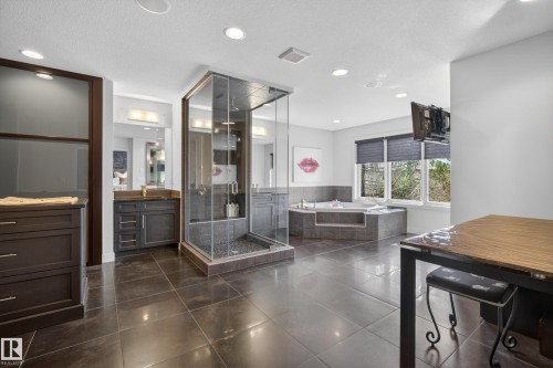 Expansive bathroom featuring large format floor tiling - 2760 Watcher Way, Edmonton, AB - Indoor Photo Showing Other Room